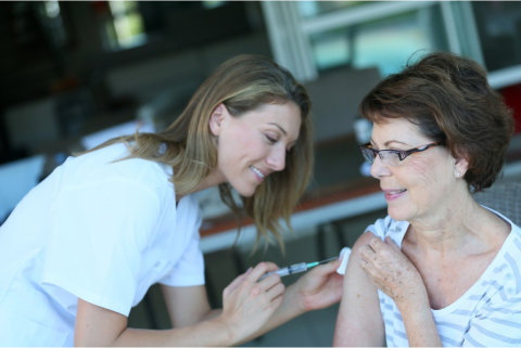 woman nurse with her patient