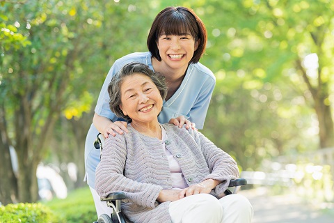 woman hugging the elderly