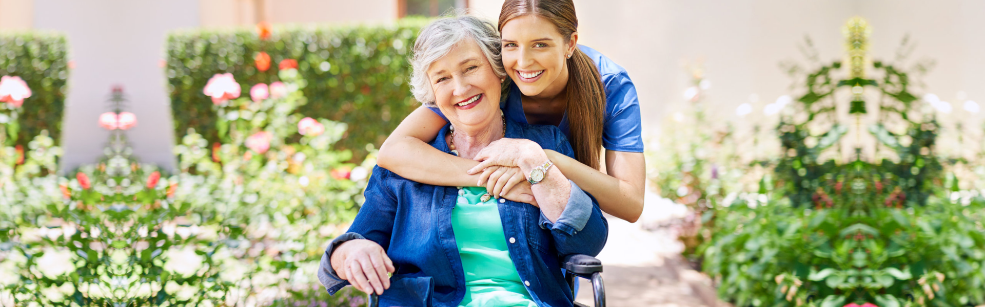 happy elderly with his caregiver