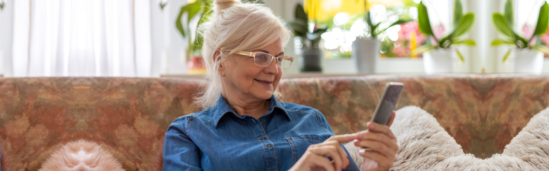 elderly woman writing a review